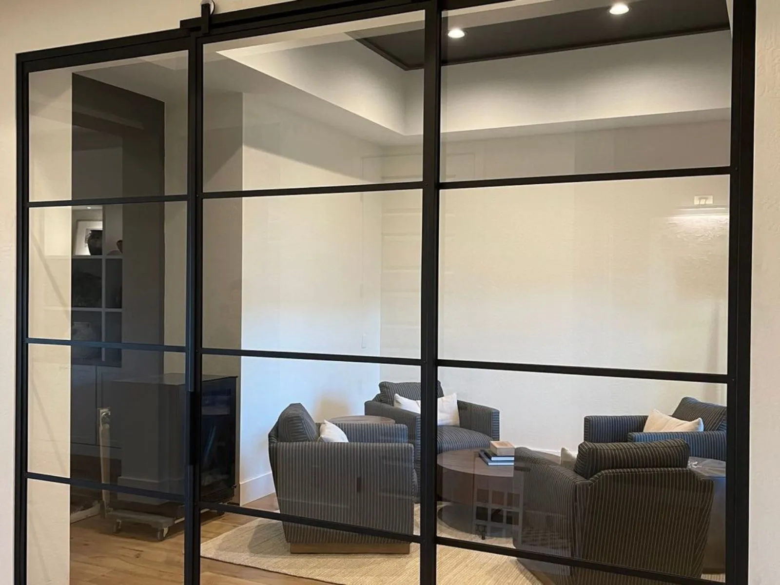 A residential sliding glass door that opens. The tempered glass is durable, and the sliding design ensures a seamless indoor and outdoor transition.